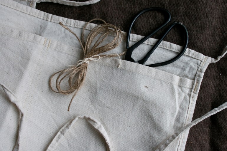 I like these plain canvas carpenter aprons.  