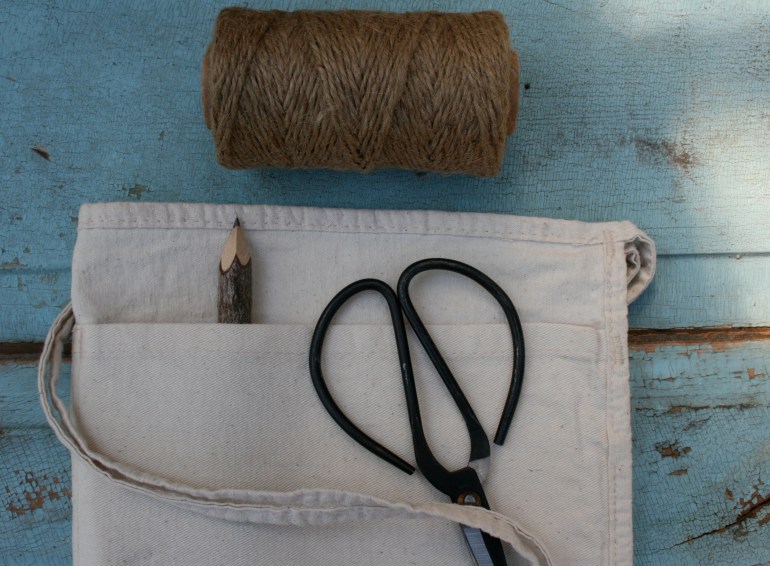 Time to tie up the tomatoes